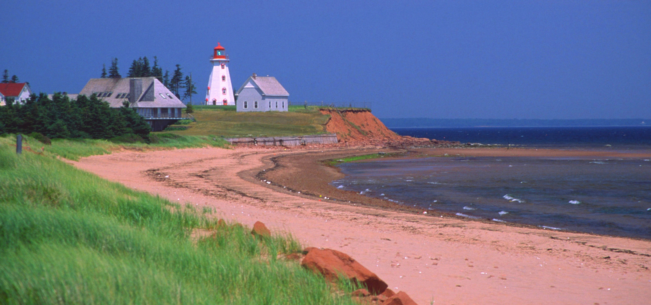 View of lighthouse and beach on Prince Edward Island 