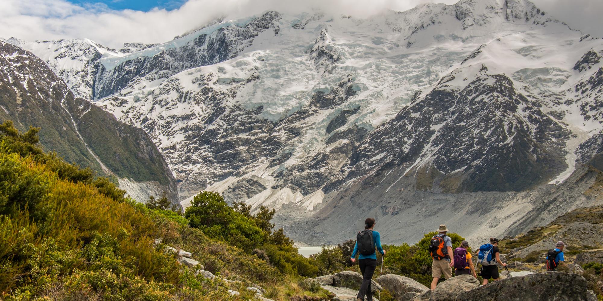 Guests hiking on the Hooker Valley Track Aoraki Mount Cook National Park