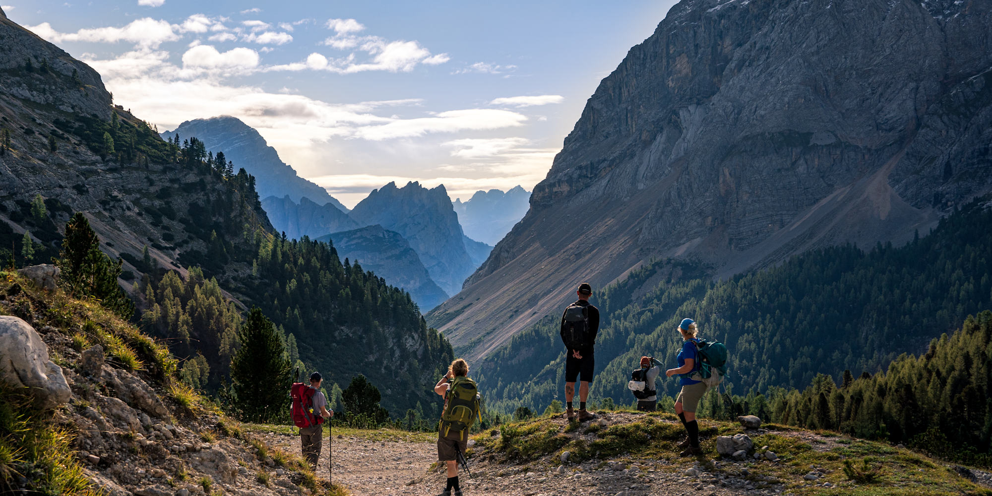 Hikers pausing to take in the views in the Dolomites