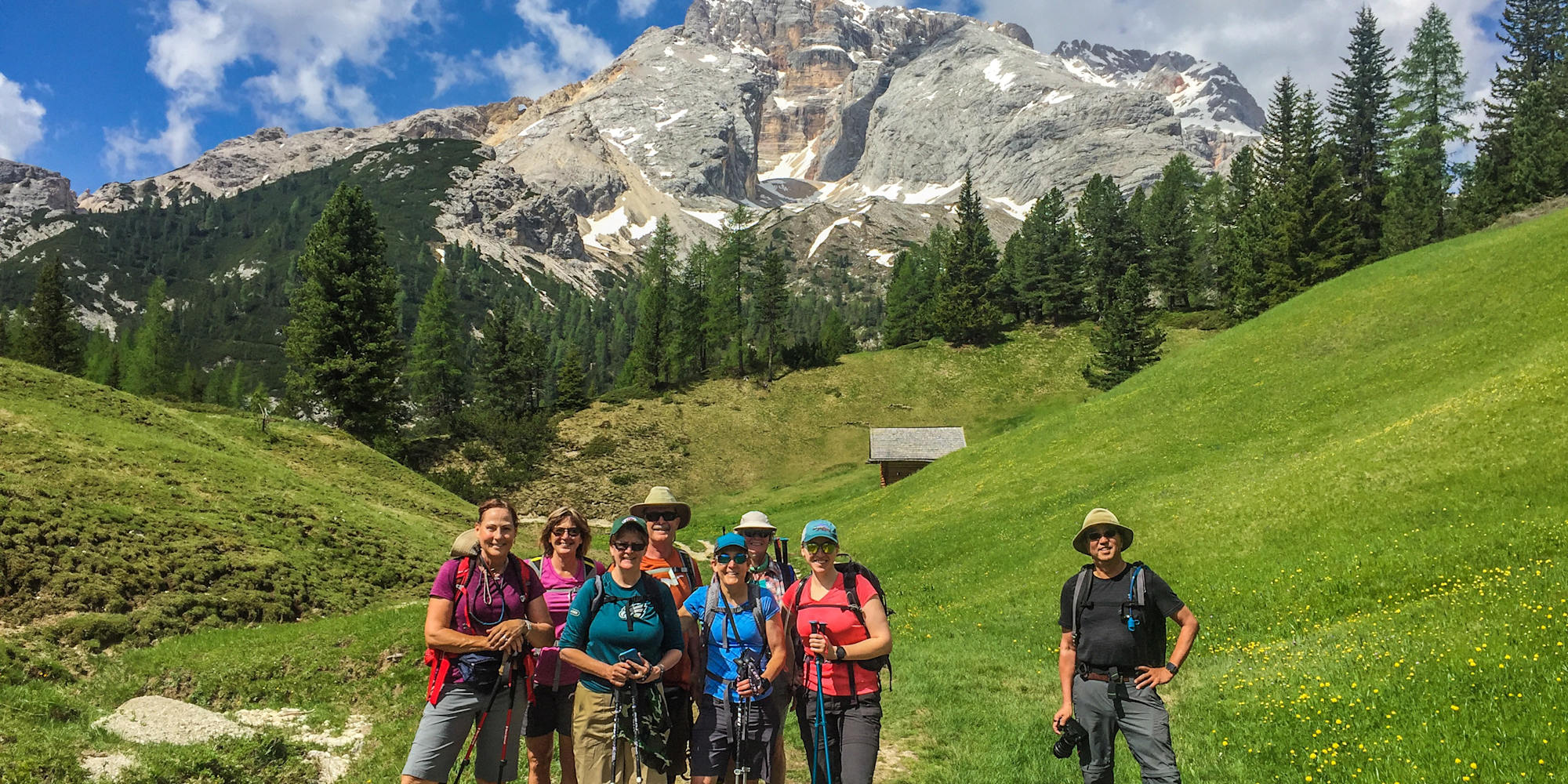 Happy hikers in August in the Dolomites