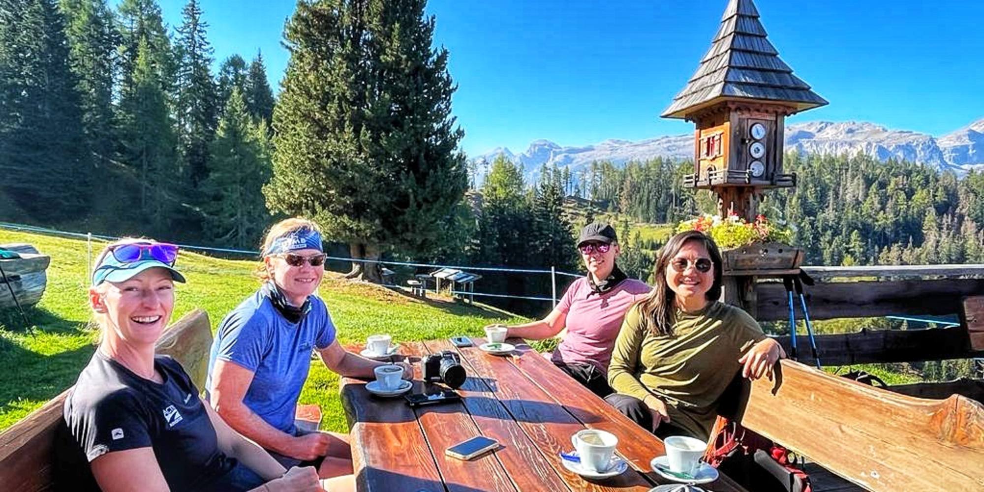 Active Adventures guests having a coffee break with their guide in the Dolomites