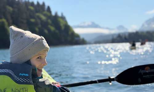 Guest on our family Alaska trip kayaking in Peterson Bay