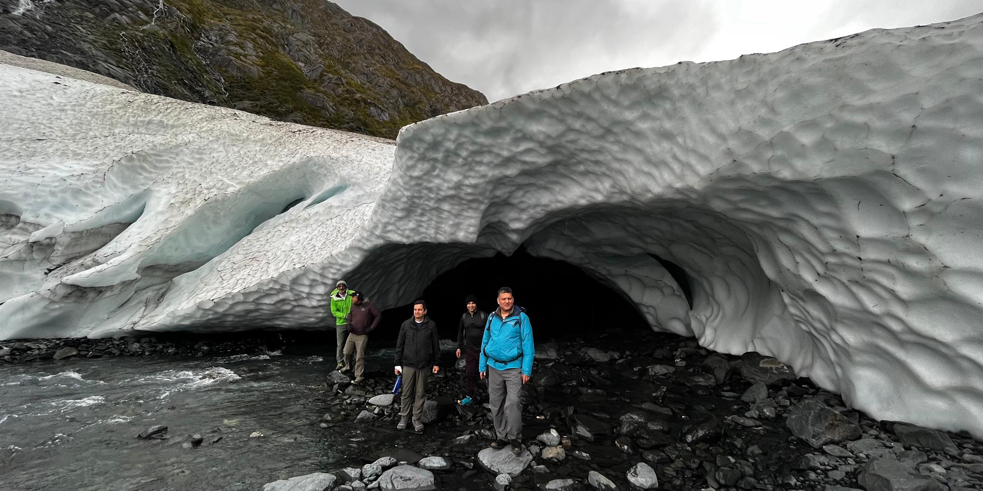 Guests investigate a glacier close up on a glacier hike in Kenai Fjords National Park