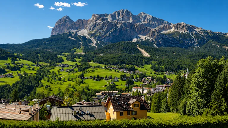 View out across a valley to the Dolomites